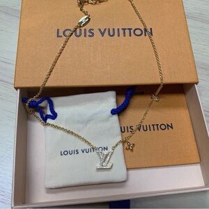 Louis Vuitton Gold Necklace with White LV Charm